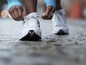 runner tying shoelaces