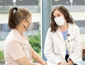 Anna Hakkenberg with patient