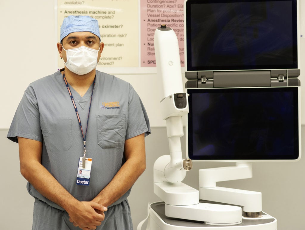 Subodh Pandey, MD, (Pulmonology) with the ION robot.