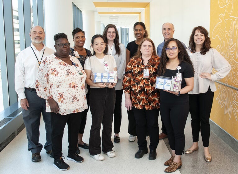 (l-r) Back row: Kevin Fox, JoAnne Watson, Carrie Kovacik, Sama Mohamud, Tony Caswell, and Hannah Fitzhugh. Front row: Etta Carson, Amy Truong, Donna Franklin, Sher Khatofi.