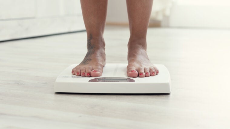 Feet on weight scale