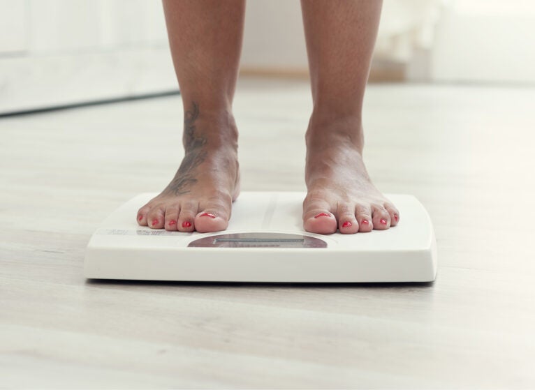 Feet on weight scale