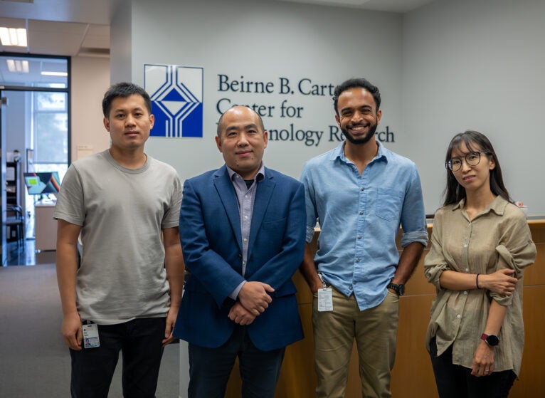 Jie Sun, PhD (center left) and lab team members