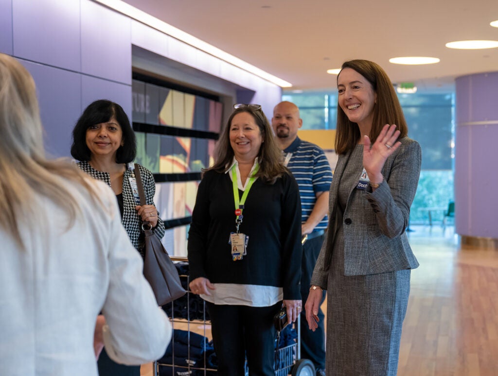 Dean Kibbe on rounds to celebrate UVA Children's ranked #1 children's hospital 4 years in a row.