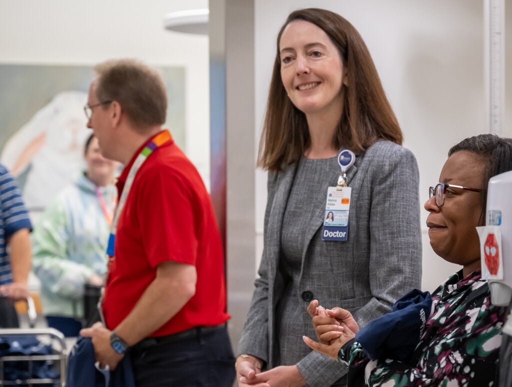 Dean Kibbe on rounds to celebrate UVA Children's ranked #1 children's hospital 4 years in a row.