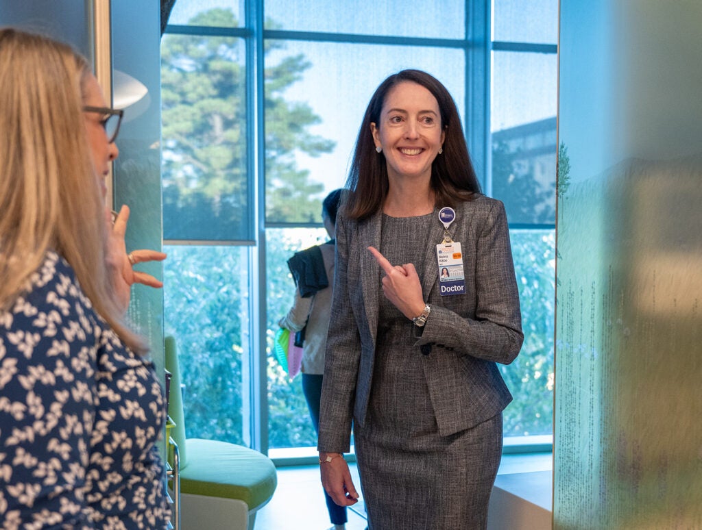 Dean Kibbe on rounds to celebrate UVA Children's ranked #1 children's hospital 4 years in a row.