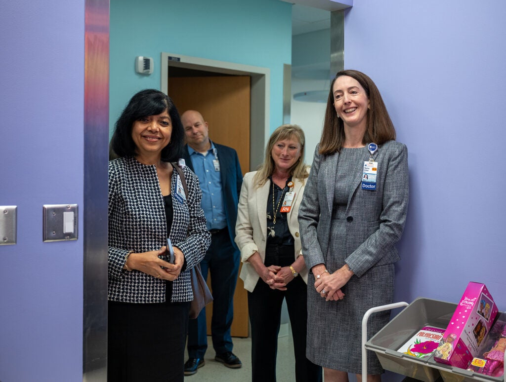 Dean Kibbe on rounds to celebrate UVA Children's ranked #1 children's hospital 4 years in a row.