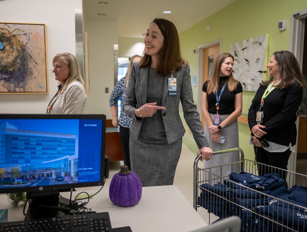 Dean Kibbe on rounds to celebrate UVA Children's ranked #1 children's hospital 4 years in a row.