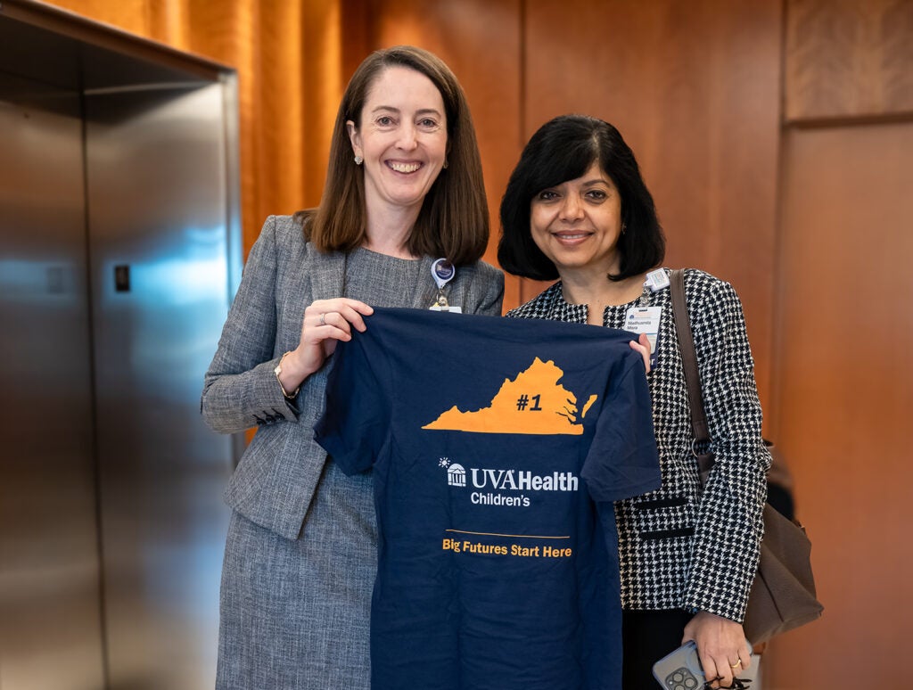 Dean Kibbe on rounds to celebrate UVA Children's ranked #1 children's hospital 4 years in a row.