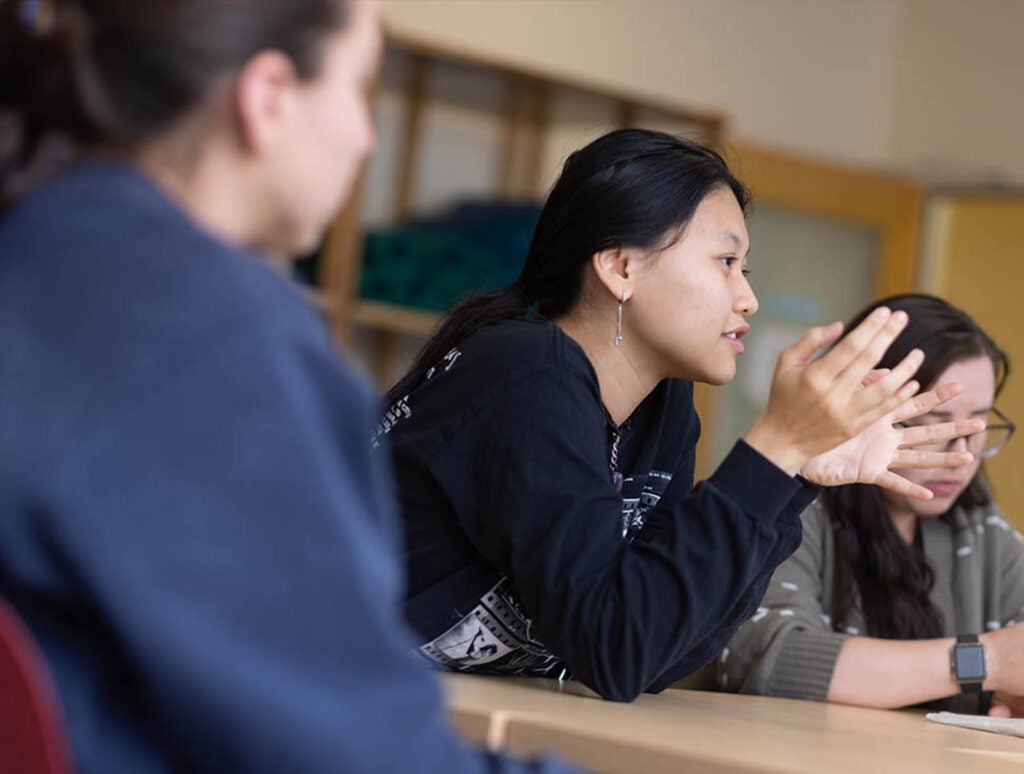 Tran, center, took part in an eight-week pilot course, Building Empathy, is a research intern with Professor Ishan Williams, and deeply engaged in student organizations from VSA to AAPINSA.