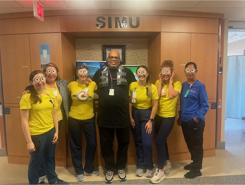 Happy Halloween from SIMU: (l-r) Caroline Talley, Lisa Weaver, Talisa Snow, Tony Epps, Hailey Ponton, Anna Utz, and Aixa Soriano.