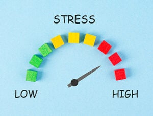 Stress loading bar, burnout syndrome and exhaustion, work life balance, low energy, high pressure, arrow point to critical scale