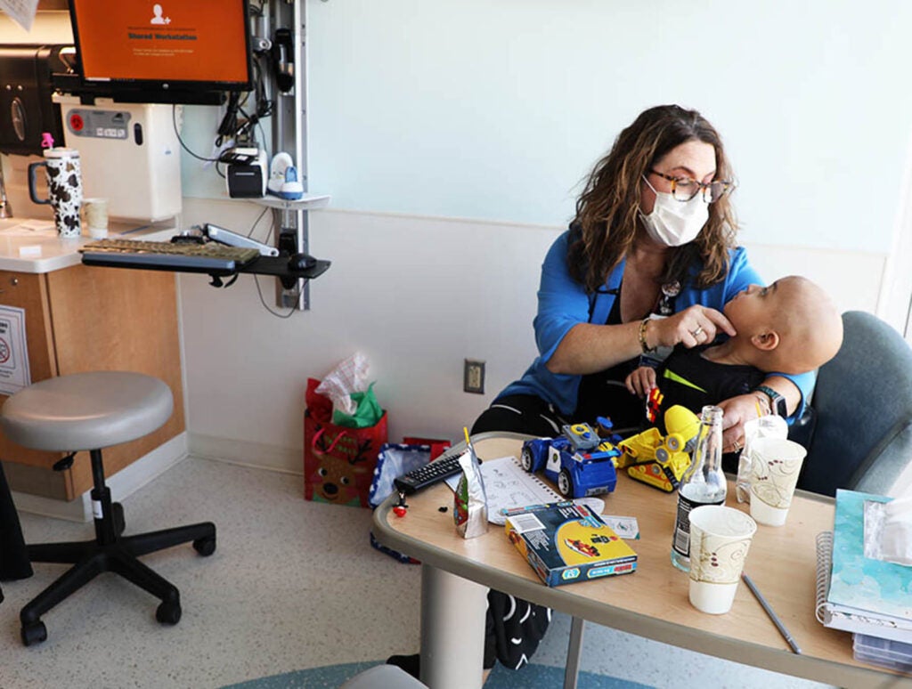 Preceptor Christy Murray locks eyes with Lincoln.