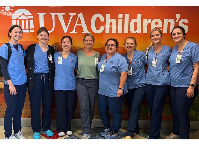 Pediatric nurse practitioner and instructor Richardson, center, with her clinical group at UVA Children's.