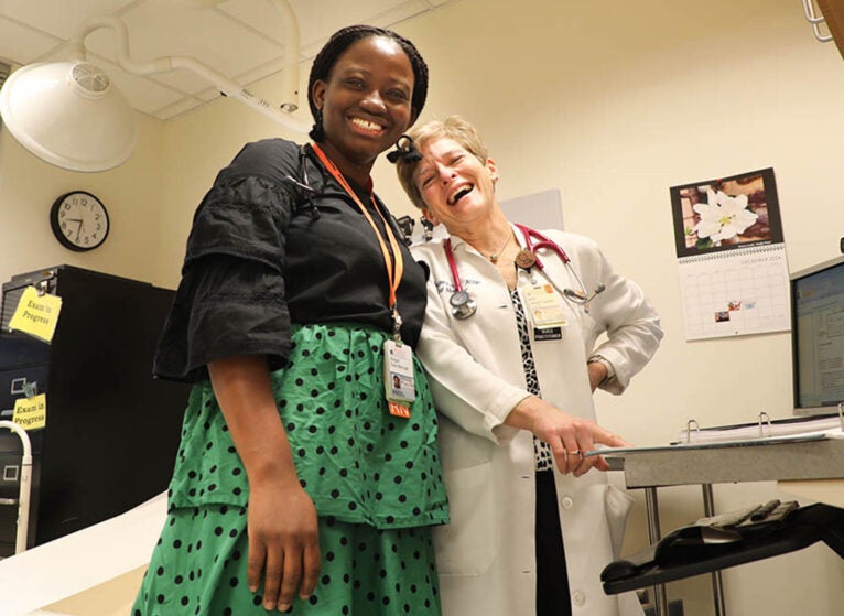 Jaeger-Landis (right), an acute care nurse practitioner, is an award-winning and long-time preceptor to advanced practice nursing students like FNP Abigail Osei-Mensah.