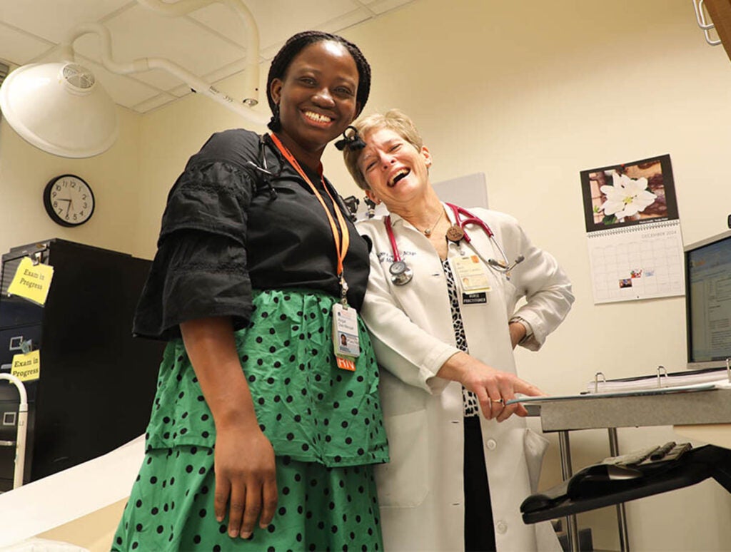 With their student mentees, long-time preceptors like Beth Jaeger-Landis (seen here with FNP master's student Abigail) exert an incredible impact on students' lives.