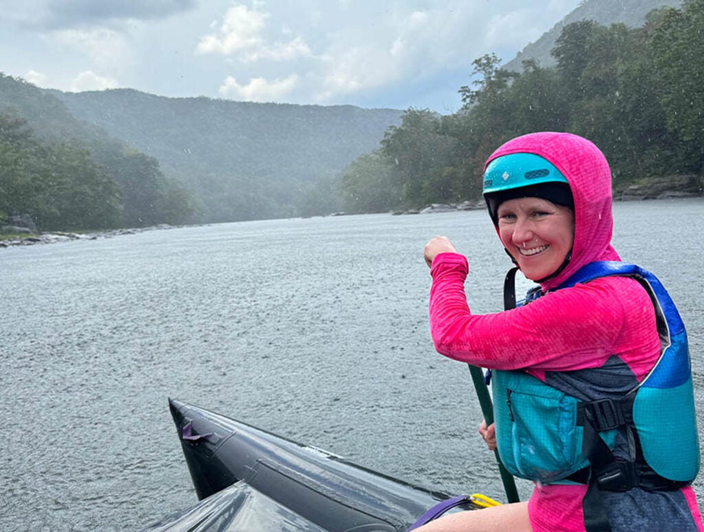 A lifelong adventure-seeker, Linsey is seen here rafting on the New River Gorge.