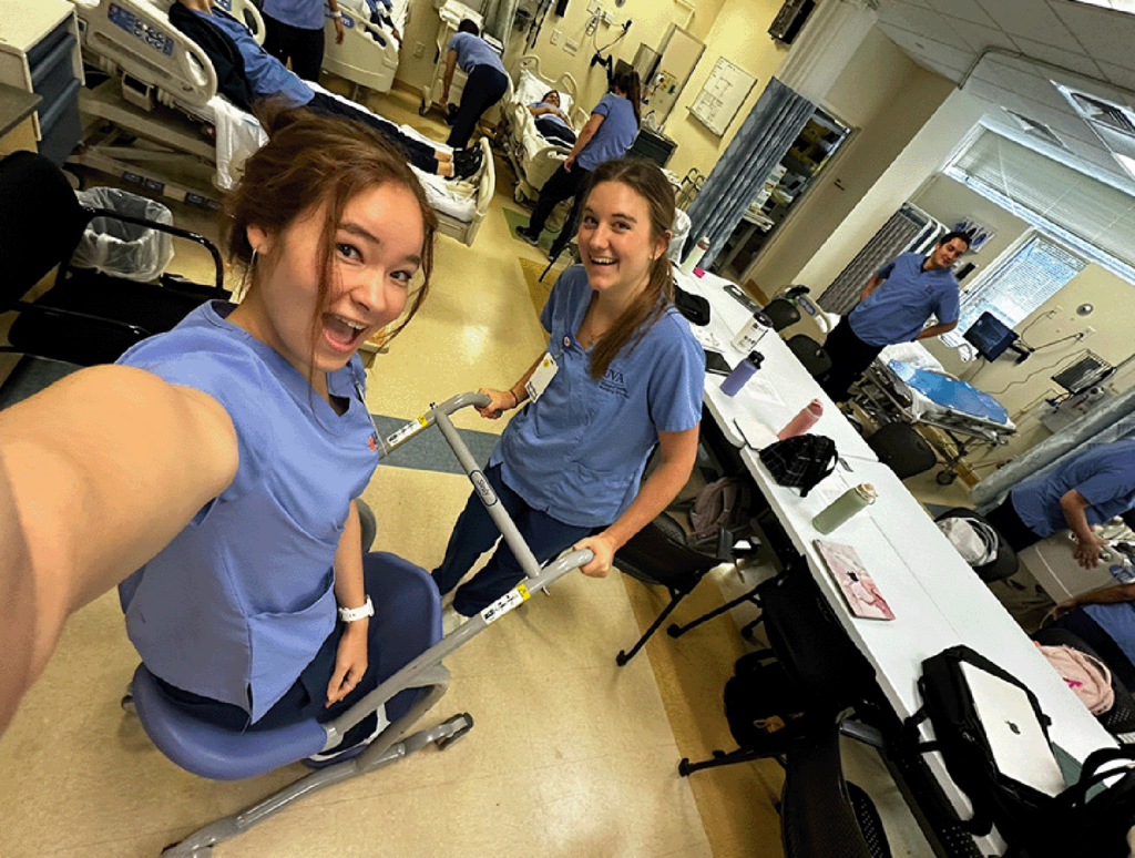 Wauer in skills lab with nursing friends.