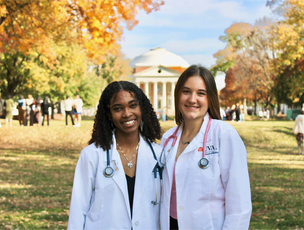 Moriah in front of the Rotunda with a nursing friend after her pinning ceremony.