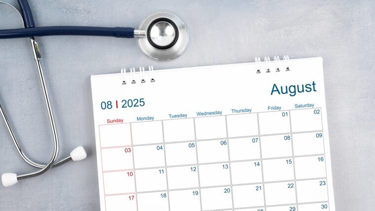 August 2025 calendar and stethoscope