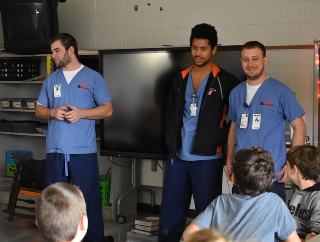 And while the School had been home to the "Men Advancing Nursing" club, or MAN Club for years, like this group of students from 2018 who did a handwashing clinic in an elementary school . . .