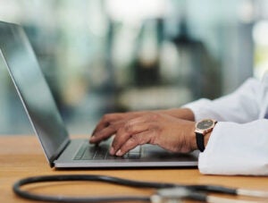 hands_computer_keyboard_laptop_stethoscope