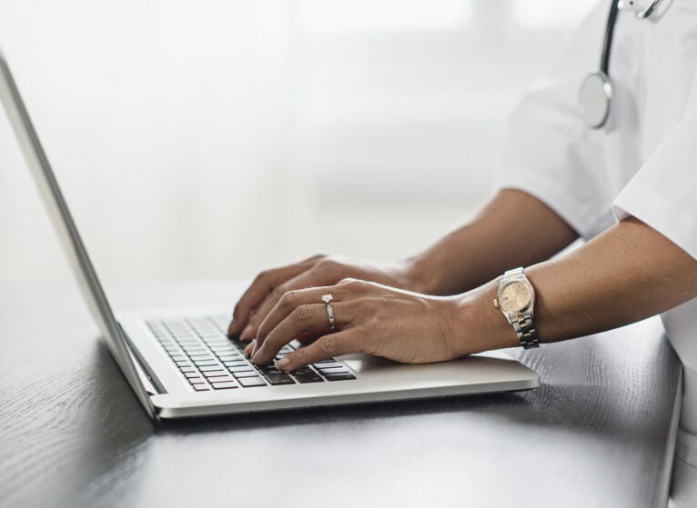 Getty_hands_laptop_stethoscope