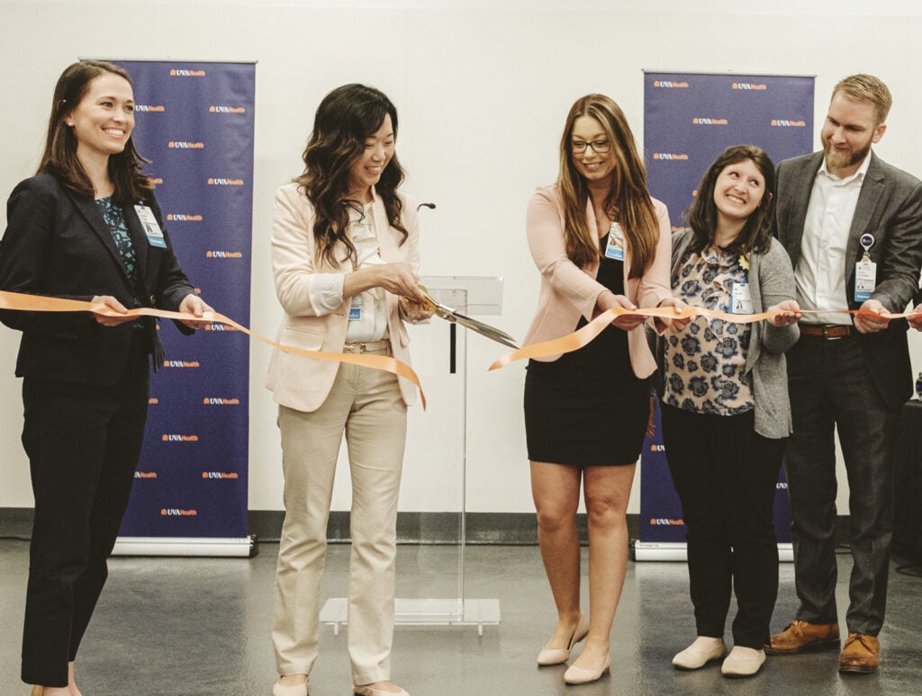 UVA Health leaders participate in a ribbon cutting at the new North Fork facility.