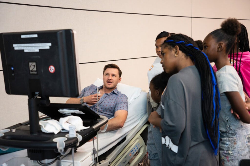 Sam Konkol, MD demonstrating how to view heart ultrasound