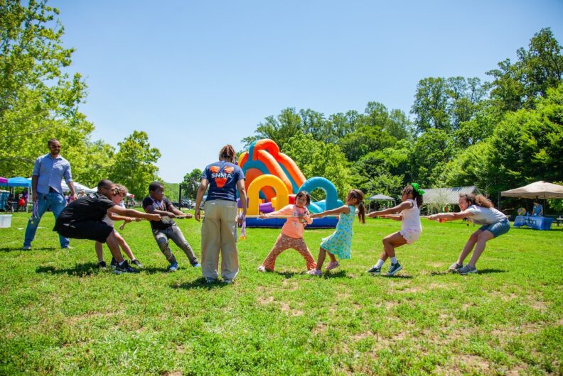 Healthy Streets Healthy People Event Photo. Children playing tug-of-war