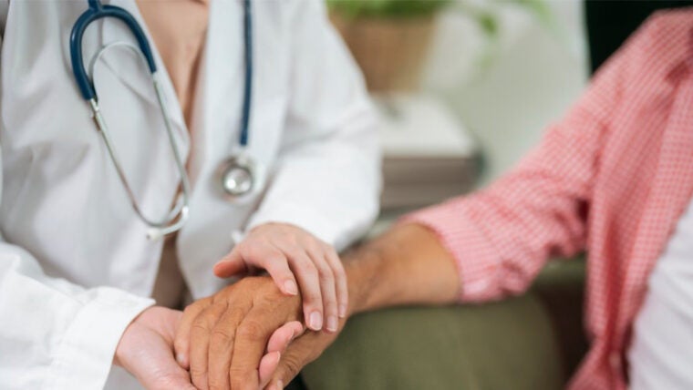 Doctor_patient_hands_Getty