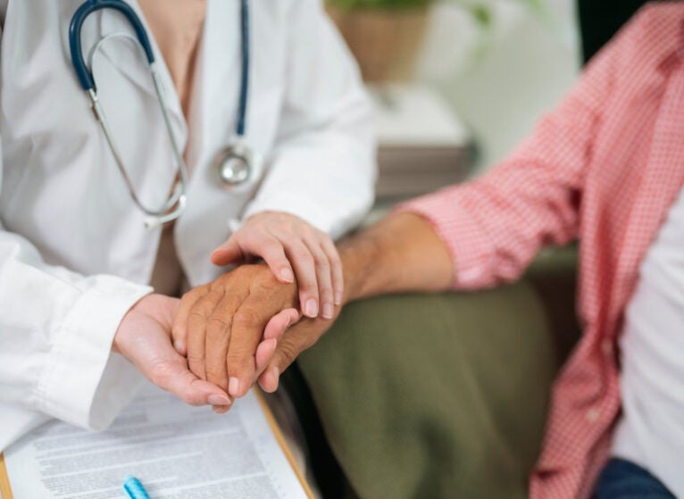 Doctor_patient_hands_Getty