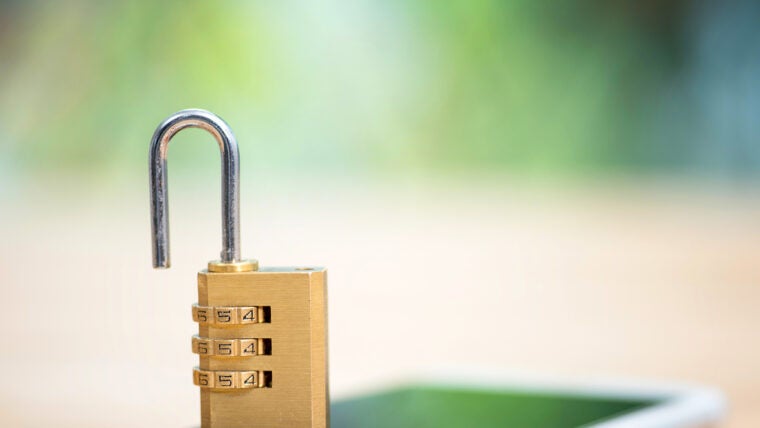 Unsecure mobile phone with open lock.