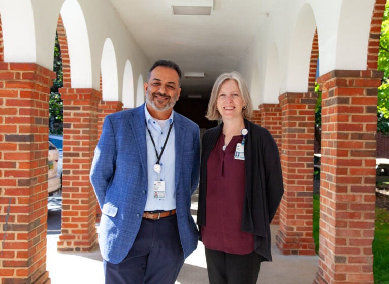 Sonney Sapra (left), MBA, UVA Health’s chief information officer, and Kate Bakich (right), UVA Health’s deputy chief information officer for health IT and interim chief applications officer, helped spearhead initiatives that led to UVA Health winning a national 