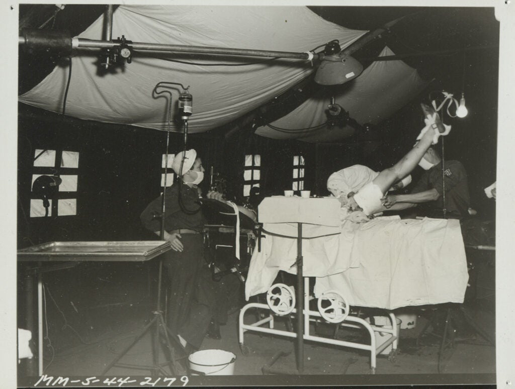 The 8th Evacuation Hospital was organized and staffed by University of Virginia physicians and nurses during World War II. In February of 1942, University President John L. Newcomb and Dean of the School of Medicine, Harvey E. Jordan, gave permission for the organization of a medical unit for war service designed to be an evacuation hospital for emergency surgical cases. Desc: 00001083